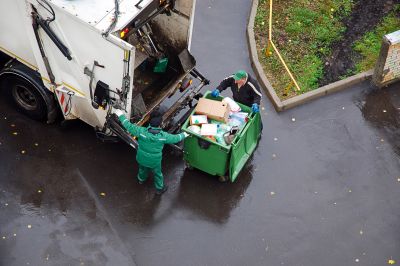 Junk removal truck in action
